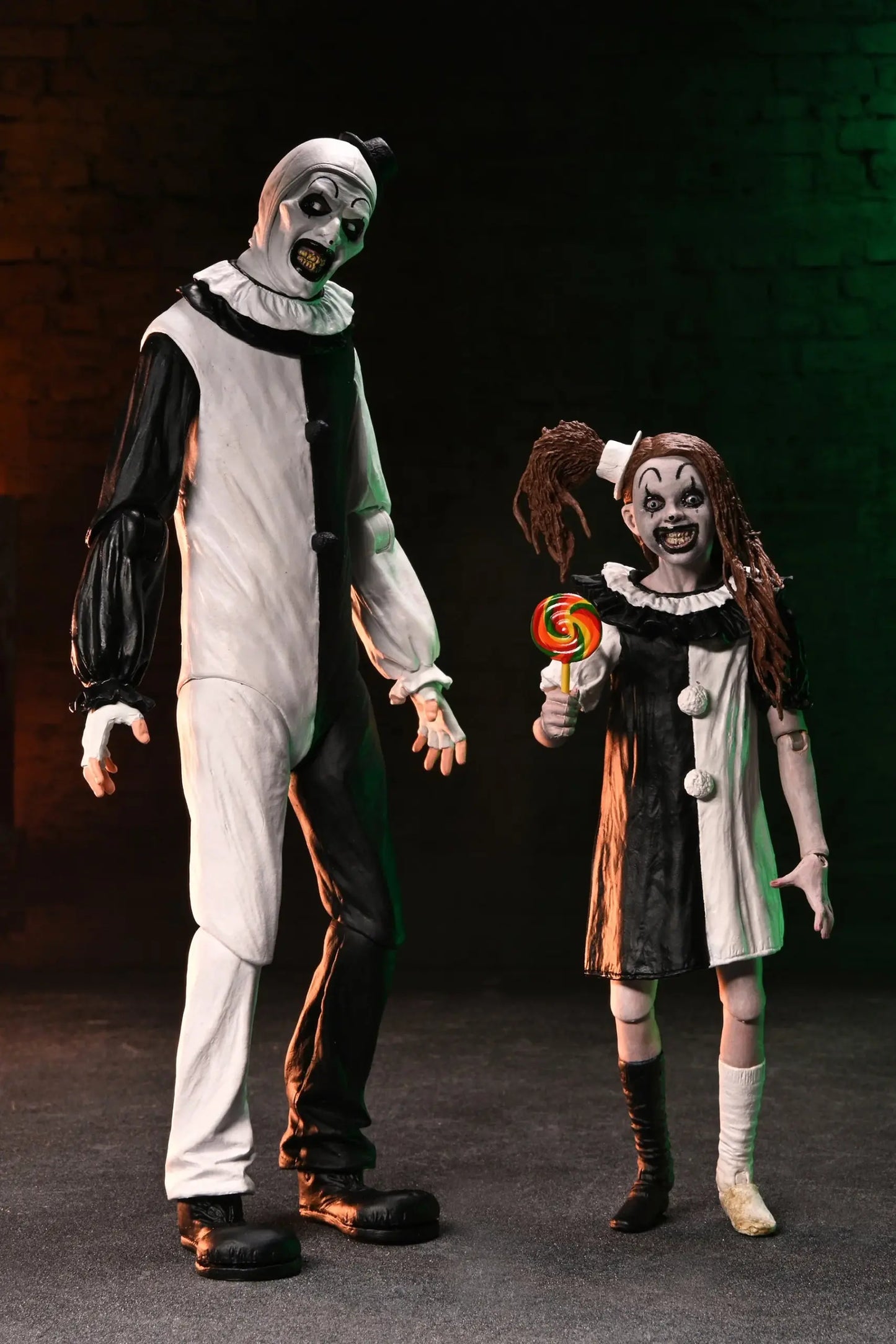 NECA Terrifier 2 – Art the Clown and Little Pale Girl Ultimate 7″ Scale Action Figure 2 Pack